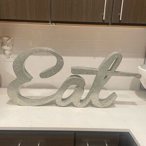 Metal 'Eat' Sign